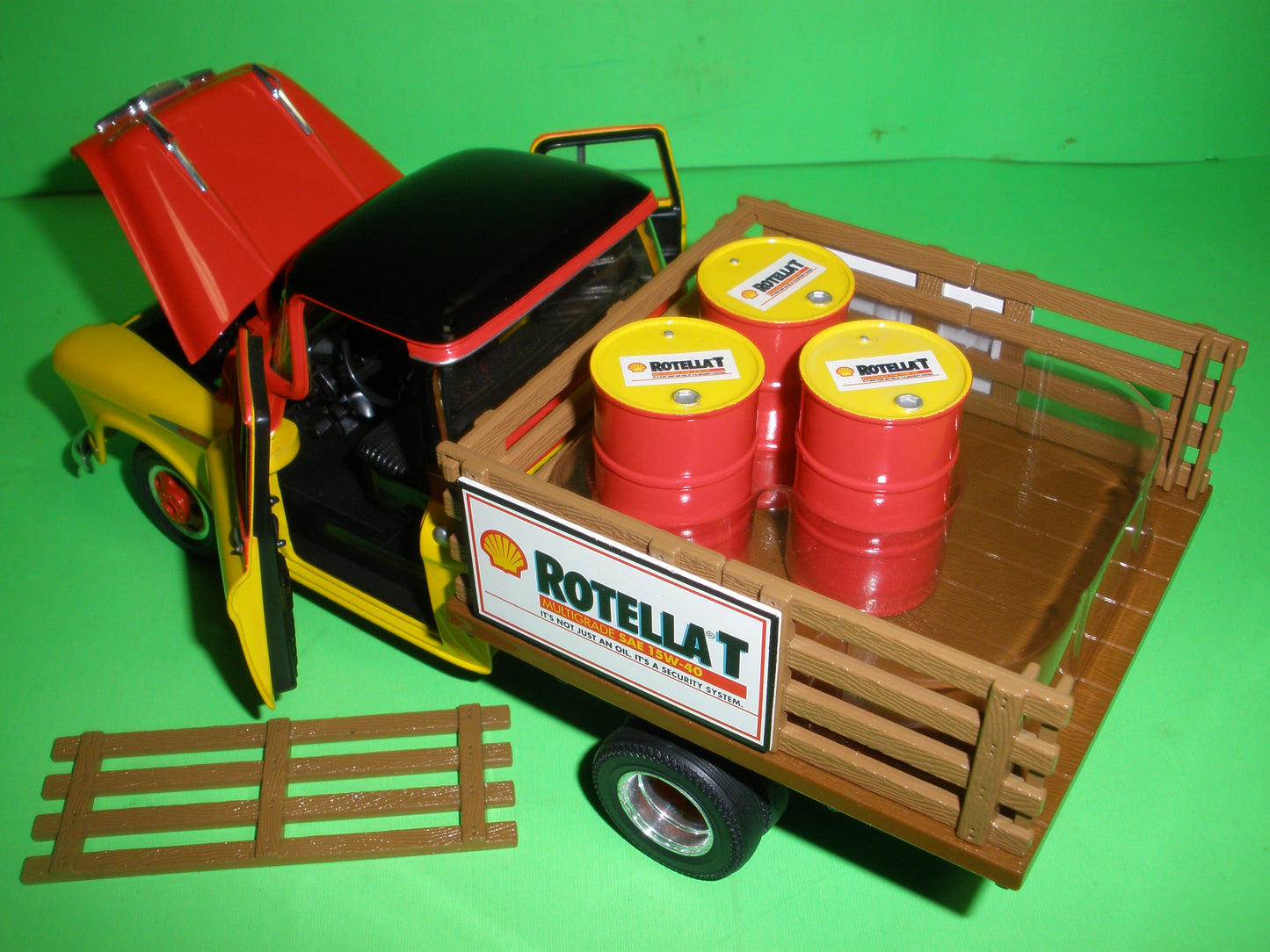 Shell 1957 Chevrolet Stakebed Truck with Barrels