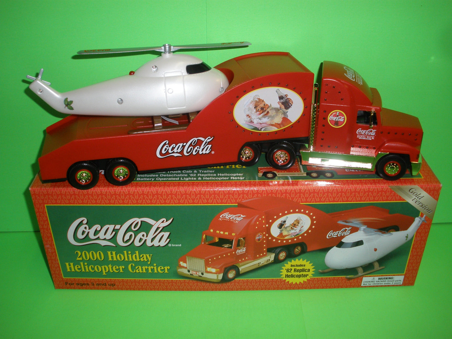 Coca-Cola 2000 Holiday Helicopter Carrier Truck - Gold Version