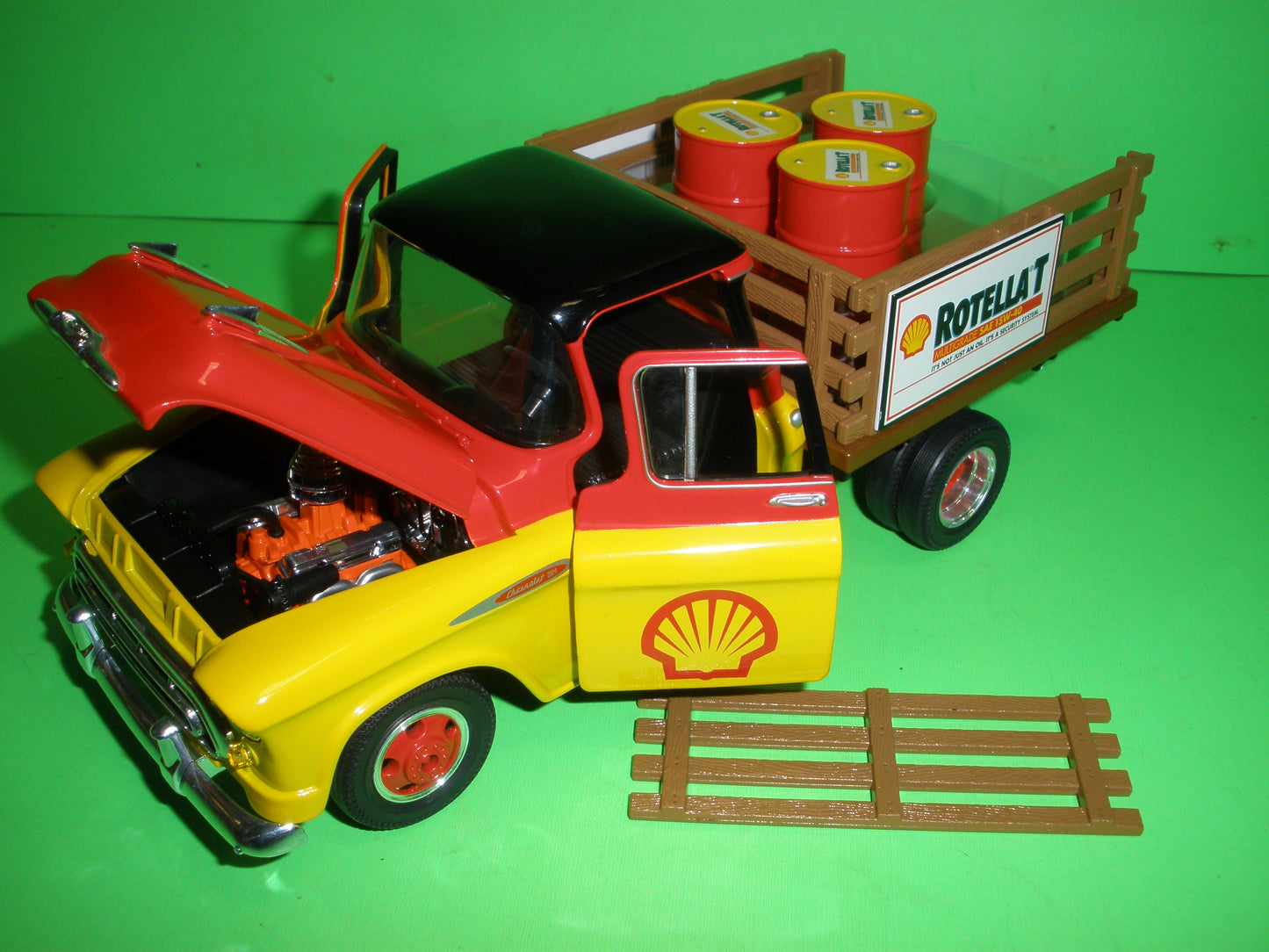 Shell 1957 Chevrolet Stakebed Truck with Barrels